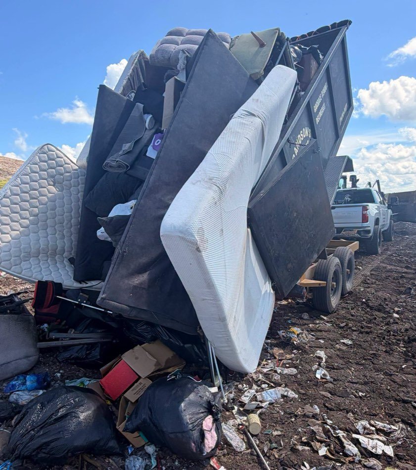 Fully loaded Grandson's Services dump trailer at the landfill