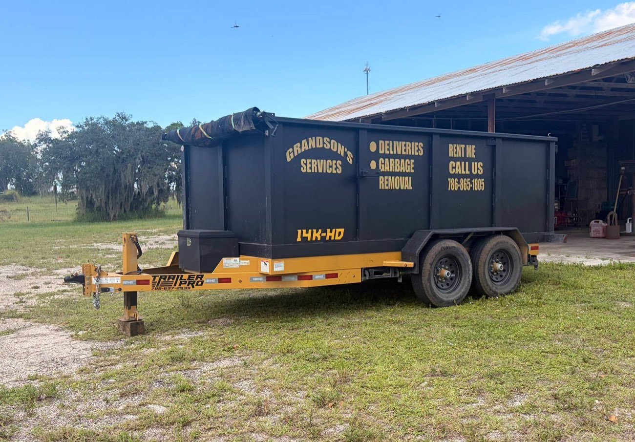 Black and gold Grandson's Services 14K heavy-duty dump trailer